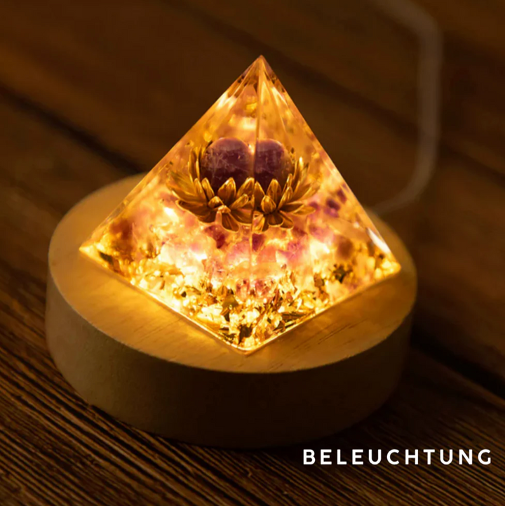 Piramide di orgonite con occhio di tigre di loto