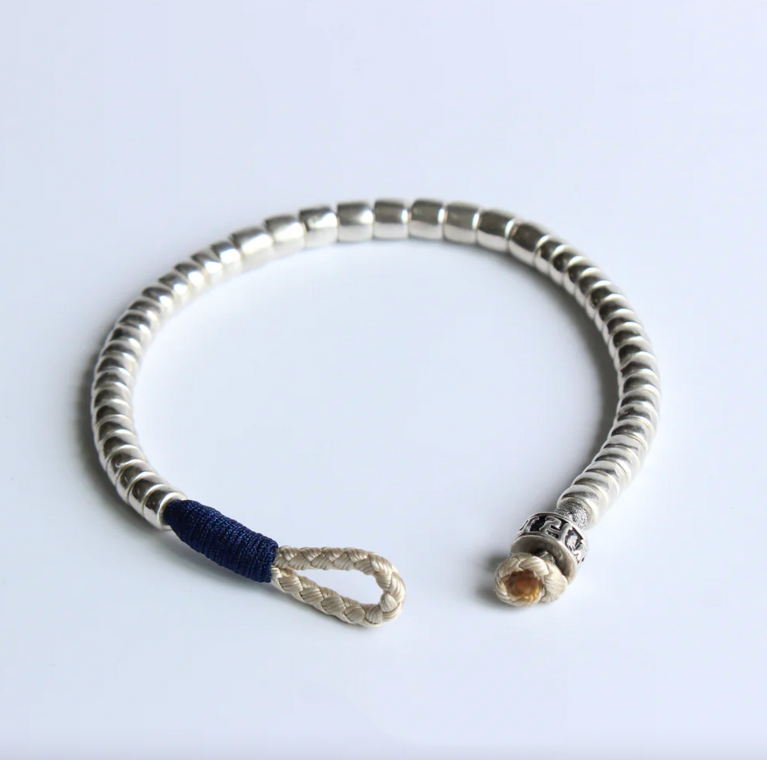 Buddha’s Whisper – Mantra  Armband